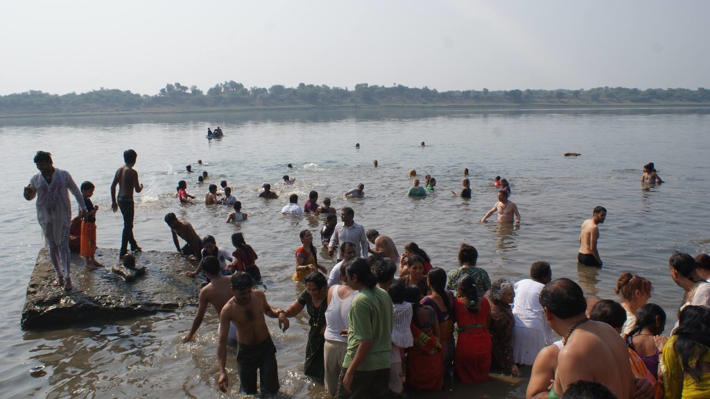 21.  Bath in the Narmada